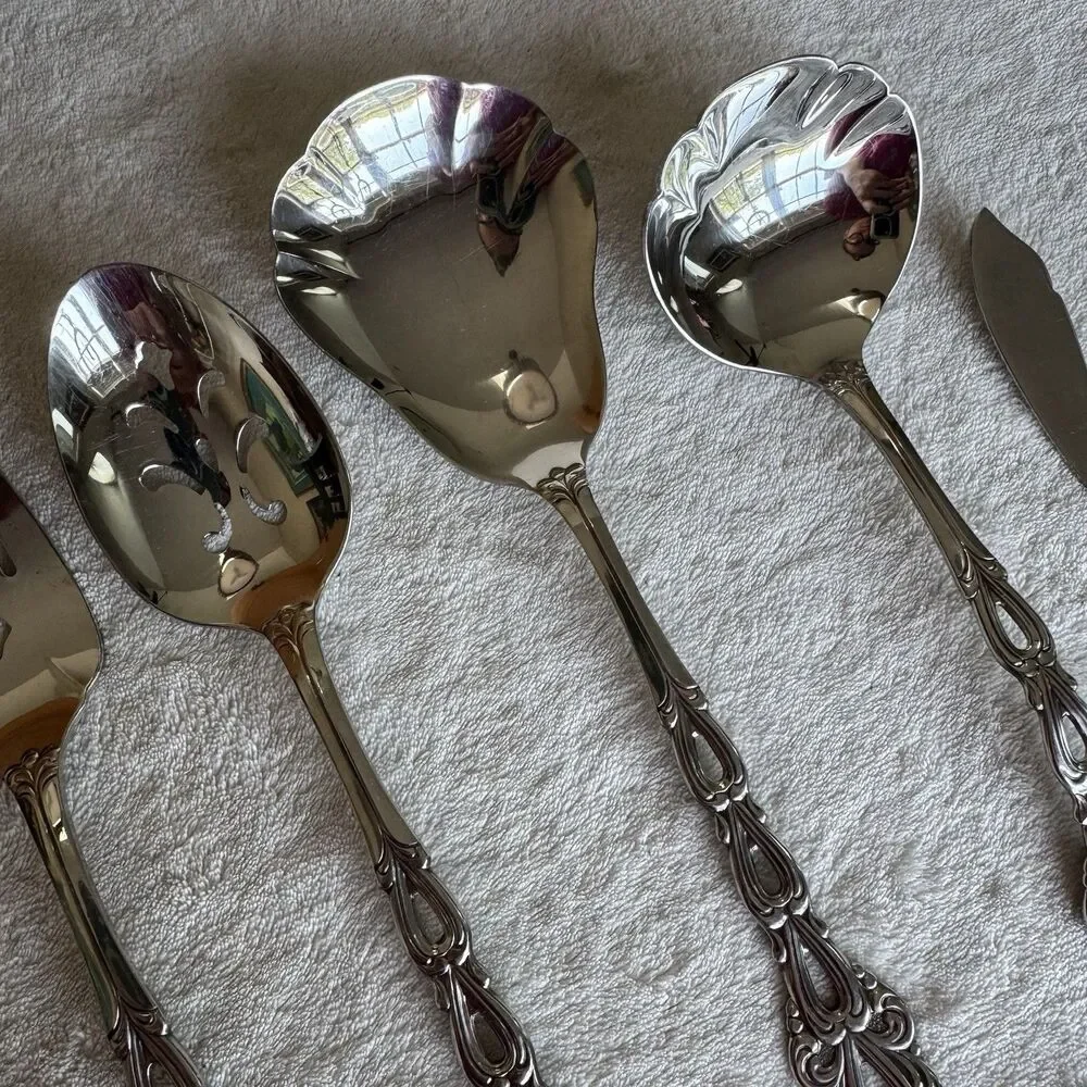 Vintage 7-piece Oneida Community Chandelier serving utensil set in stainless MCM